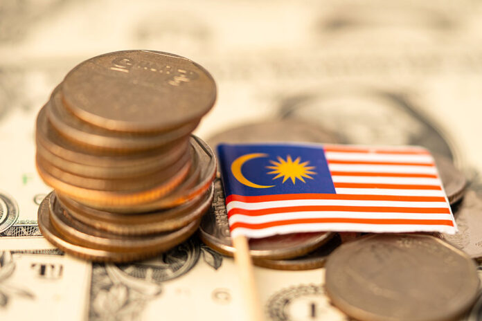 Malaysia-Flag-On-Coins-Backgro